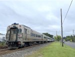 Comet V Cab Car # 6078 brings up the rear of NJ Transit Train # 4351 after it departs Bradley Beach Station toward its next stop of Belmar.